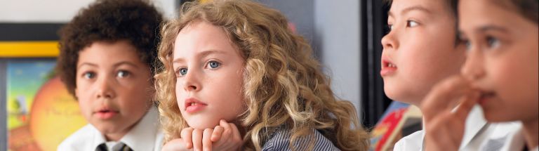 Children sitting next to each other
