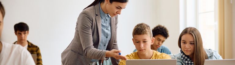 Teacher supervise secondary school students