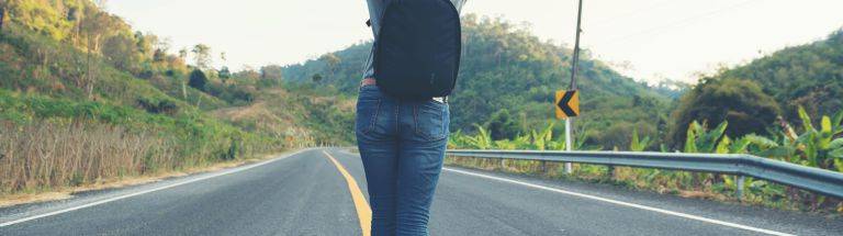 Person looking down the road